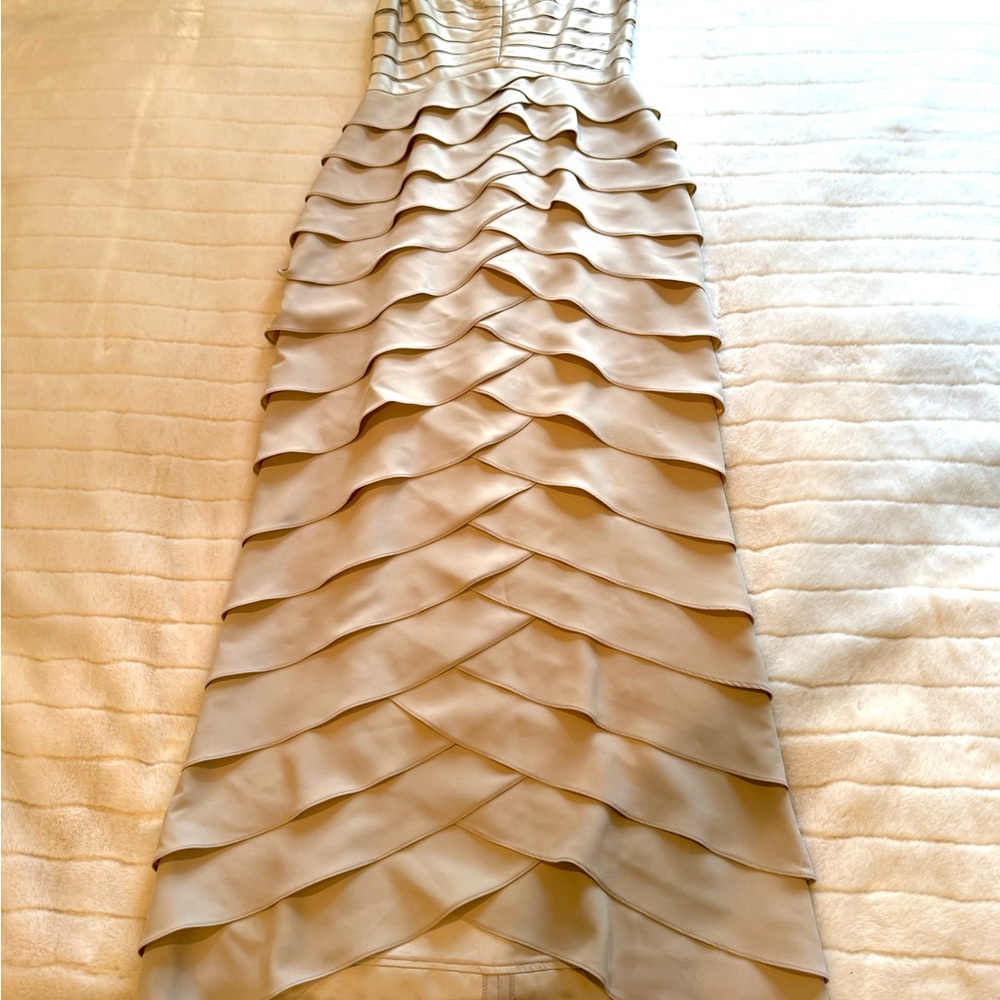 Xscape long dress with layered design. Perfect for special occasions.